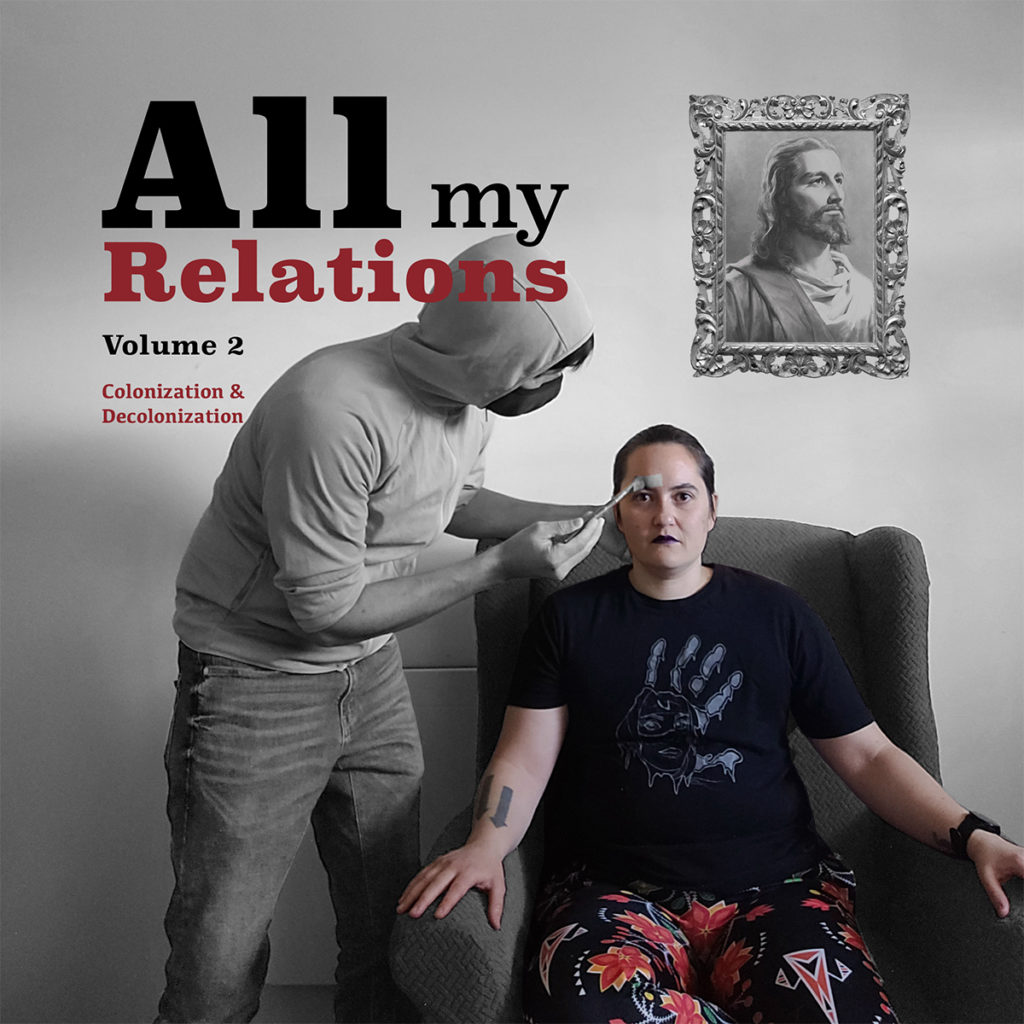 Cover art from All My Relations Volume 2 showing a mixed-race Indigenous person sitting in a gray environment. A white man (who is also gray) holds a paint brush and is painting away the color in the Indigenous person.